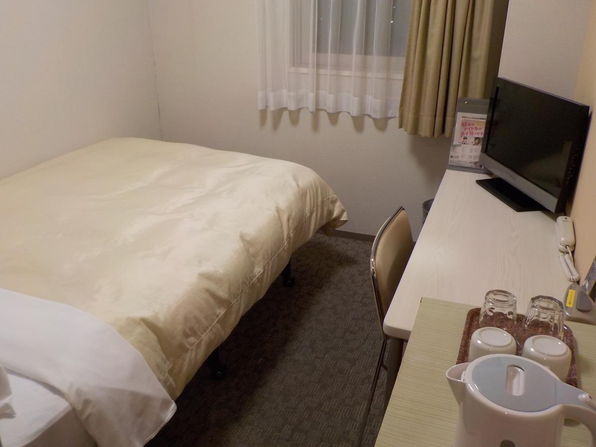 Hotel Crown Hills Katsuta Omotechoten Хитатинака Номер фото